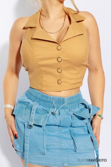 Falda corta, con pretina de elastico con dos bolsas alfrente tipo cargo