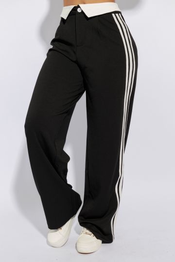 Pantalon ancho con tres franjas a los costados y pretina doblada para afuera